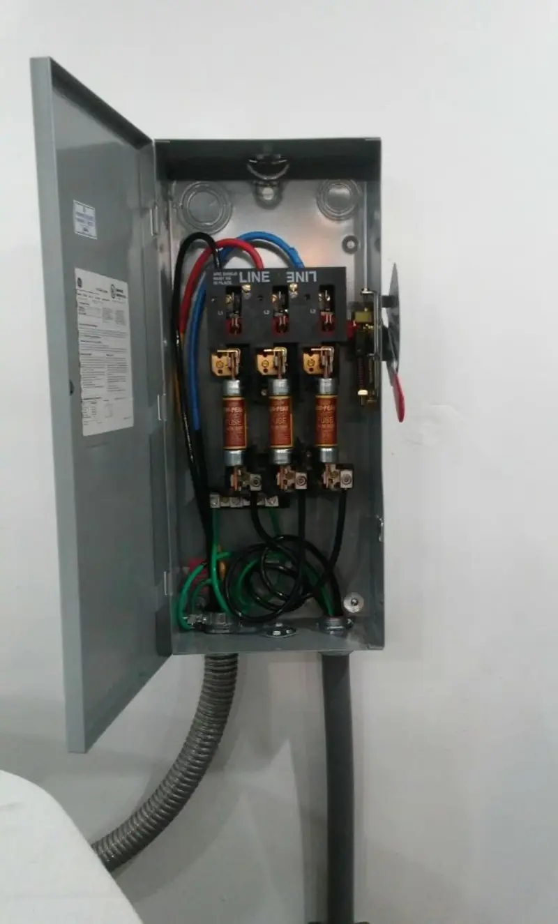 Three-phase disconnect switch installed for Smoke Detector Installation in Mauston